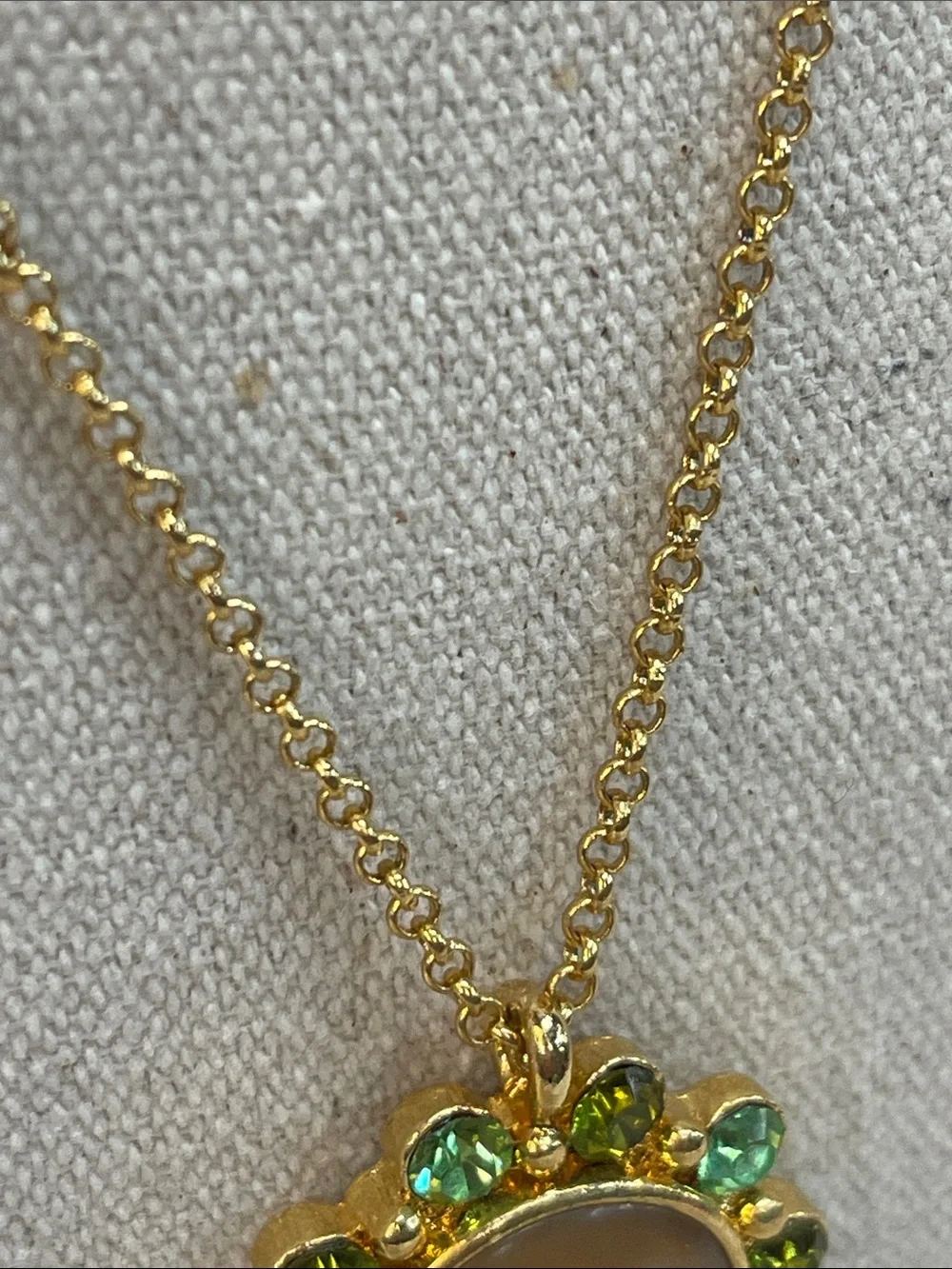 Gold-Tone Necklace with Beige Center and Green Crystal Halo